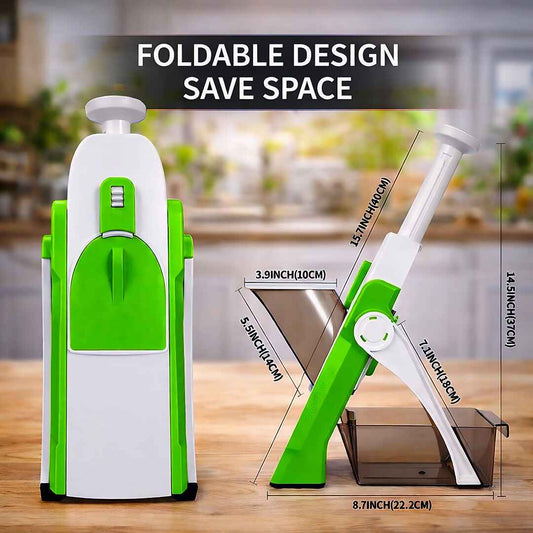 Green and white foldable kitchen tool named vegetable chopper/slice/cutter on a wooden surface with measurements displayed.