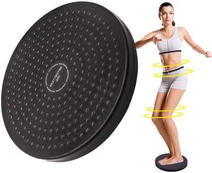 Tummy twister Black exercise disc with a woman using it for core training on a white background